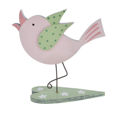 Wood material spring Easter decor bird standing on a heart in fashion design